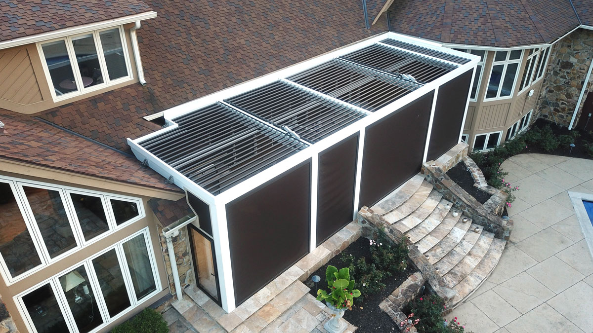 Aerial view of The Smart Pergola® attached to home with screens